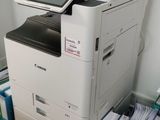 a printer that is sitting on top of a desk