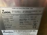 an image of a label on a stainless steel dishwasher