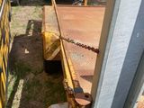 a truck that is parked next to a fence