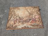 une vieille tapisserie sur laquelle est représentée une scène biblique