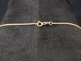 a close up of a gold bracelet on a mannequin mannequin mannequin mannequin mannequin mannequin mannequin manne