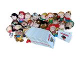 a pile of stuffed animals sitting on top of each other