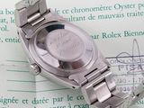 a watch that is laying on top of a piece of paper