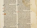 an old book with writing on it and a page in the middle