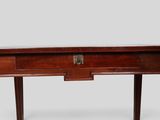 an old wooden desk with a drawer on top of it