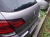 cars parked in a row on the side of the road