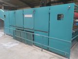 a large machine that is sitting inside of a building