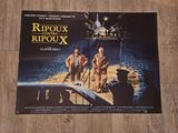 L'affiche du film « Rappoux de Rifox » est posée sur un parquet.
