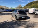 many cars parked in a parking lot in a parking lot