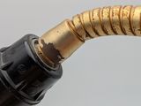 a close up of a hose with a nozzle attached to it