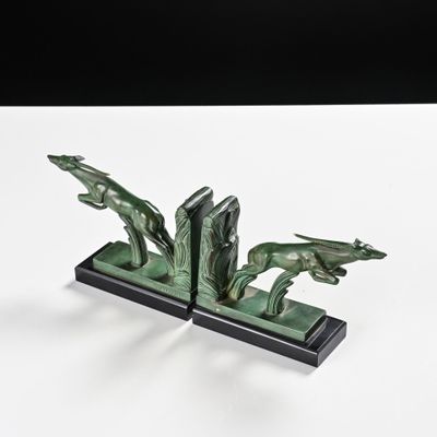 paire de serre-livres Art déco en forme de dauphins