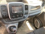a dashboard of a car with a radio in it