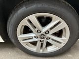 a close up of a tire on a car ' s rim