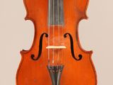 an old violin with a bow on a white background