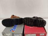 pair of men ' s shoes in boxes on a white surface