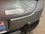 the rear end of a car with a sticker that says vauto on it