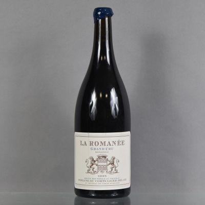 a bottle of wine that is sitting on a table