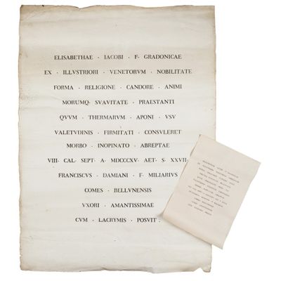 a piece of paper with writing on it next to a piece of paper