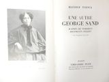 a book with a picture of a woman in a dress