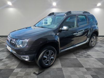 a picture of a black dacia parked in a garage