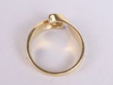 an image of a gold ring with a diamond on top of it