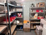 a room with a lot of shelves and boxes on the shelves
