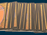 a lot of cards that are stacked on top of each other