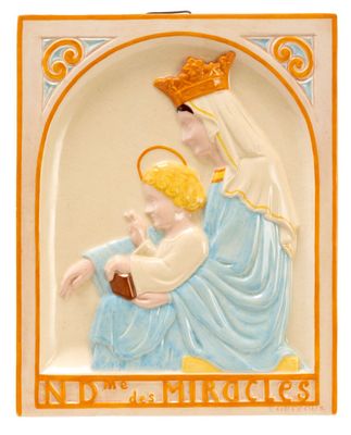 an image of a ceramic figurine of the virgin mary and child jesus