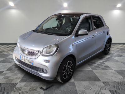 an image of a smart car parked in a showroom