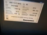 a sign on the side of a refrigerator stating that it is not working