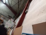 a blurry photo of a person walking through a warehouse
