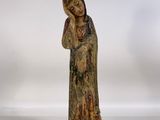 statue of a woman holding a baby in her arms