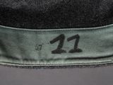 a close up of a hat with the number 11 on it
