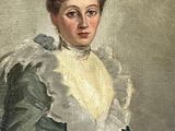 painting of a woman in a green dress sitting on a chair