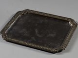 a silver tray that is sitting on a table