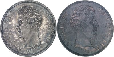 a close up of a coin with a woman ' s head on it