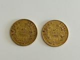 two gold coins, one of which is a sovereign and the other of which is a sovereign