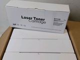 a box of white laser toner cartridges sitting on top of a cardboard box