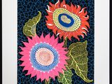 an image of a picture of two sunflowers on a blue background