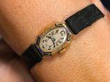 a close up of a person ' s wrist with a watch on it