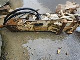 a piece of machinery that is sitting on the ground