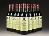 six bottles of red wine are lined up in a row