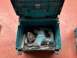 a blue tool box with tools in it on the floor