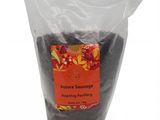 a bag of black sesame seeds on a white background
