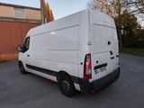 a white van that is parked in the parking lot
