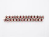 a red and white bracelet on a white background