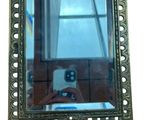a person taking a picture of themselves in a mirror