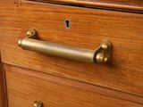 a close up of a drawer with a handle on it