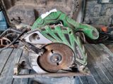 someone is using a circular saw to cut a piece of wood