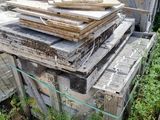 many pieces of wood stacked on top of each other